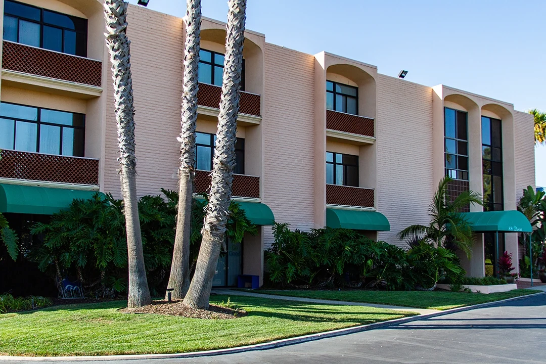 Dover Newport Beach office building landscaped exterior — Chase Merritt