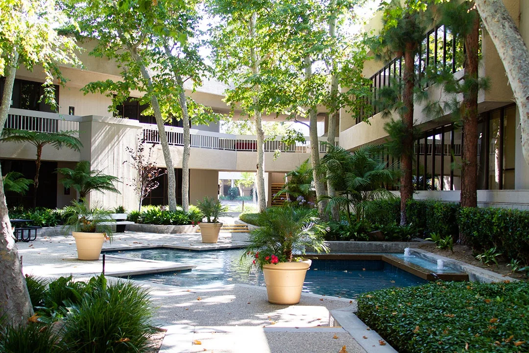Newport Atrium landscaped courtyard and water feature — Chase Merritt