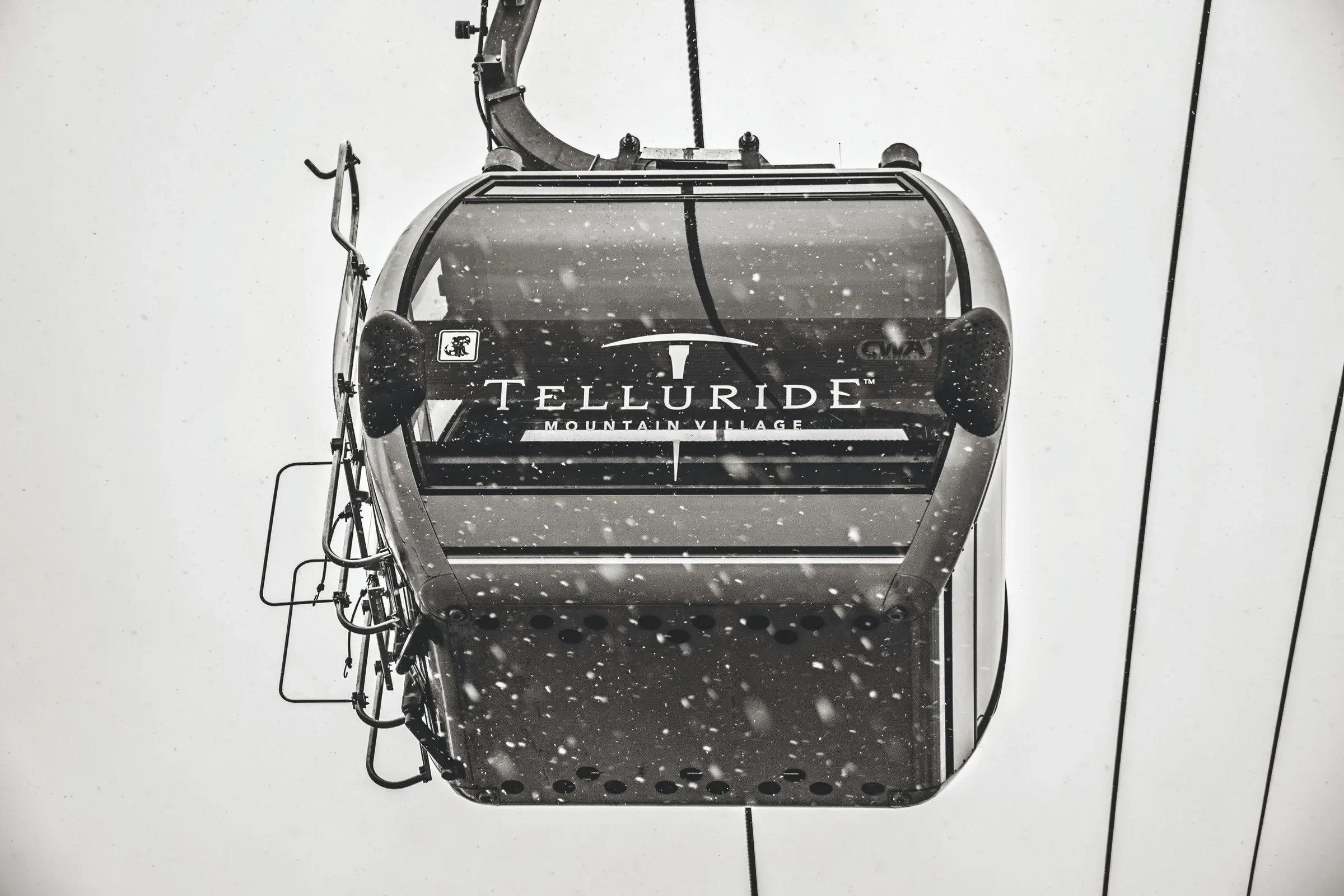 Telluride gondola moving above the mountain village